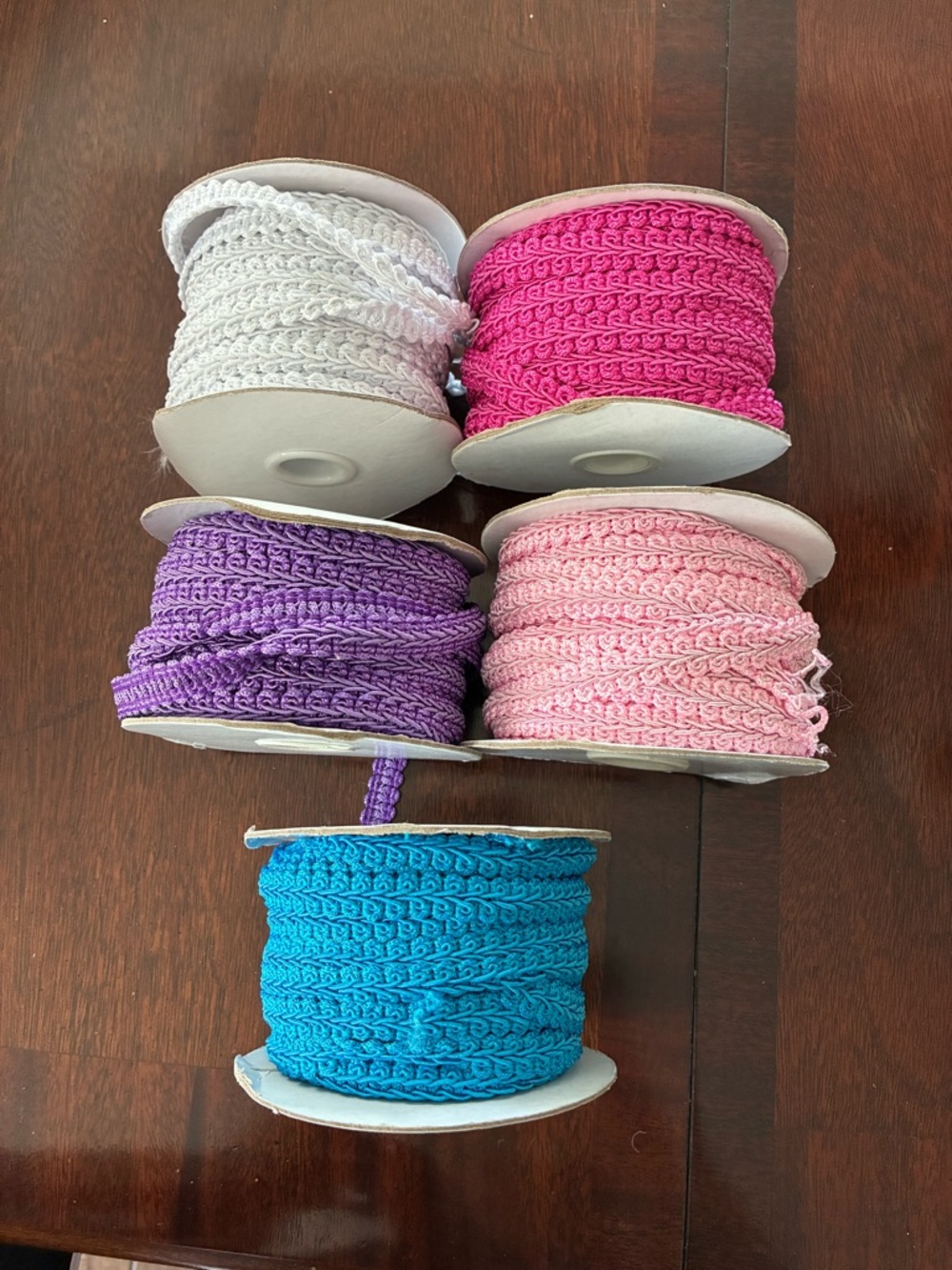 Assorted Crochet Trim Spools in White, Hot Pink, Purple, Light Pink, and Blue